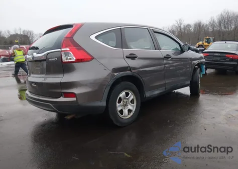 2015 Honda Cr-V Lx z USA, uszkodzony, nr VIN 2HKRM4H39FH632864
